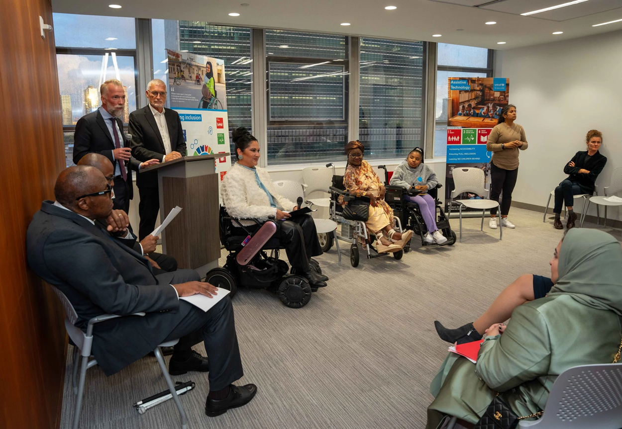 ATscale event on the margins of the SDG Summit. Michele Sumilas, Assistant to the Administrator of the Bureau for Policy, Planning, and Learning at USAID, makes her opening statement. UN Headquarters can be seen through the window.