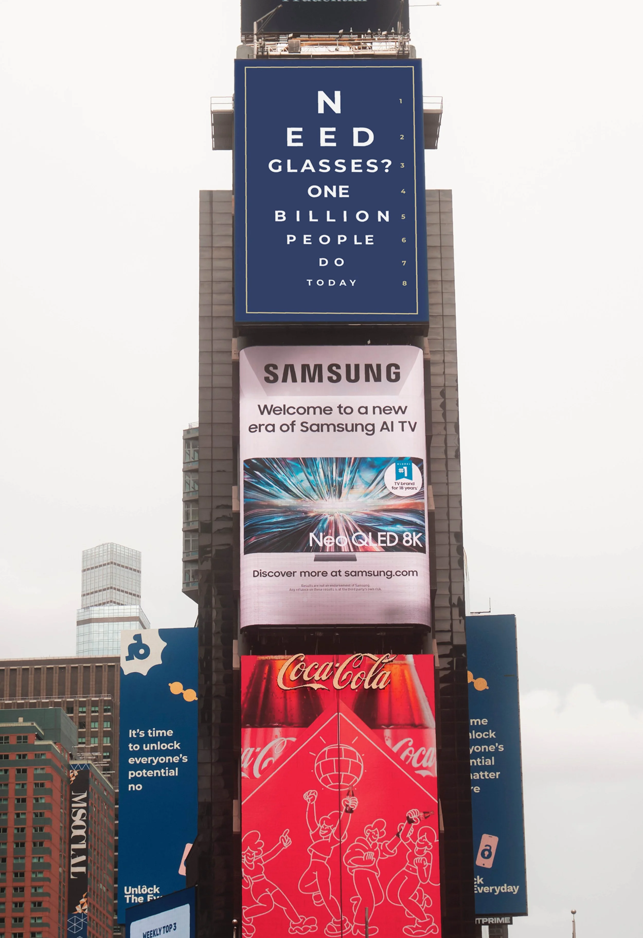 Billboards in Times Square showing the campaign at the top and two sides