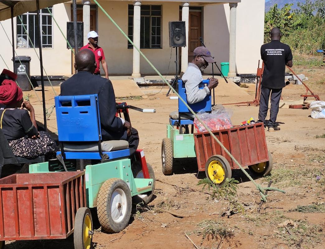 Farmers with disabilities in Machinga district showcasing carts/trolleys produced from AgriLab with support from the IFAD-funded Programme for Rural Irrigation Development (PRIDE) in collaboration with SPARK Project