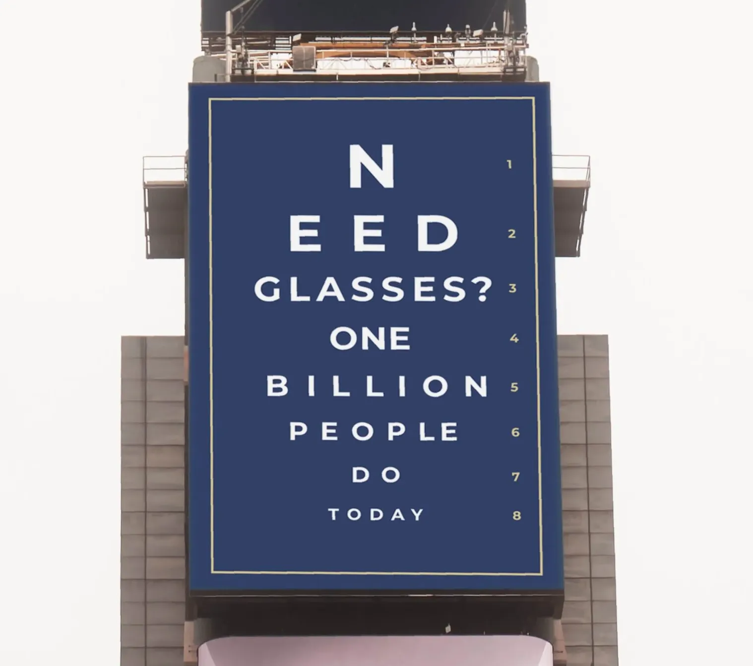 Tall digital billboard in a city square displaying multiple ads, including a large message reading ‘Need glasses? One billion people do today,’ above commercial brand advertisements.