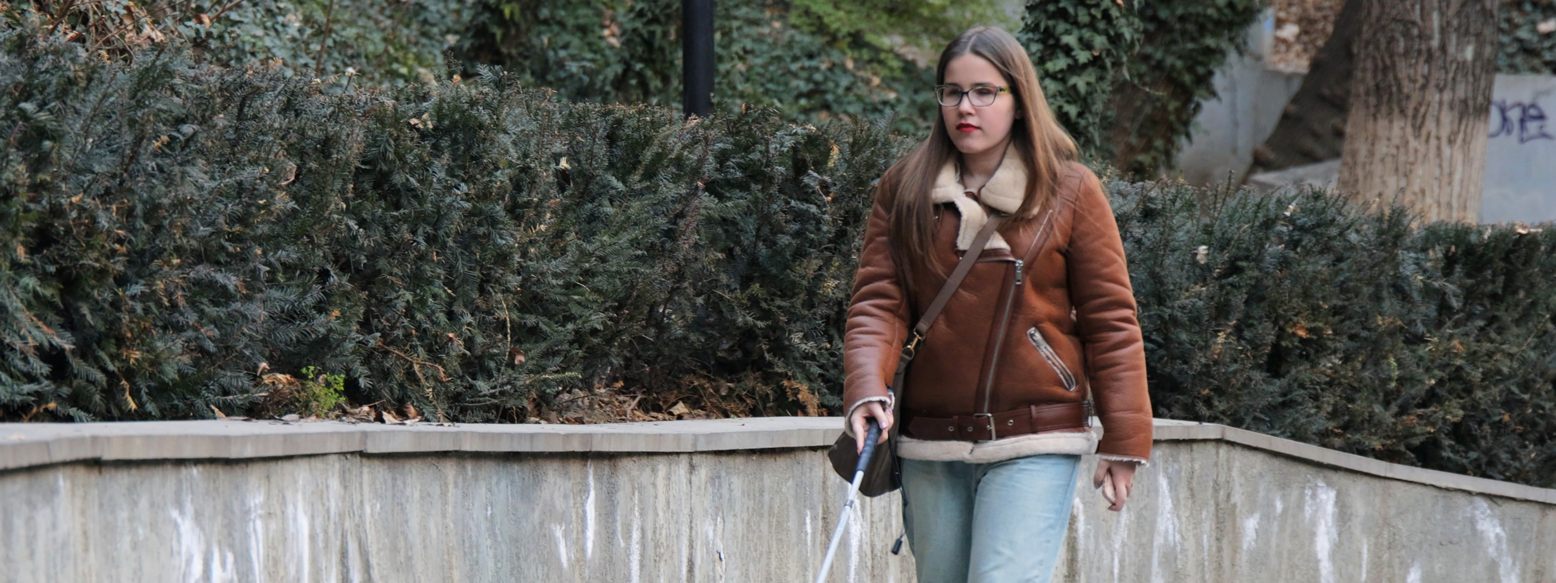 Ana Sikhashvili, a disability rights activist and university student in Georgia, on the way to her classroom